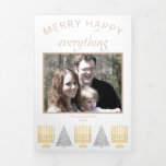 Merry Happy Tan Interfaith Elegant 3 Photo Tri-Fold Holiday Card<br><div class="desc">Personalized luxury tri-fold holiday cards in this tan and white MERRY HAPPY EVERYTHING interfaith design featuring 3 of your photos is an elegant way to send holiday cheer this year. A row of faux gold Hanukkah Menoras and polka dot silver Christmas trees along the bottom of these white and tan...</div>
