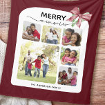Merry Memories Photo Collage Christmas Fleece Blanket<br><div class="desc">This Christmas fleece blanket features a joyful and heartwarming collage of family photos on a dark red background. At the top, the phrase “MERRY memories” is prominently displayed, blending a bold, festive font with elegant calligraphy script. A red and green ribbon bow adds a cheerful holiday touch in the upper...</div>