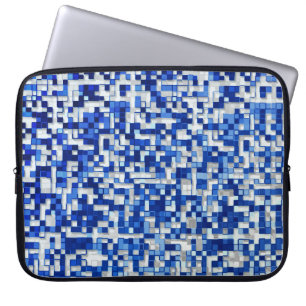 Mess of small squares, shades of blue with white laptop sleeve