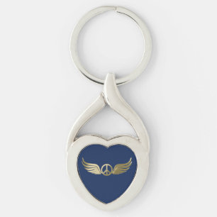 Metal look peace symbol with wings key ring