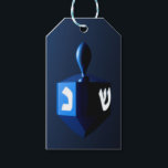 Metallic Blue Dreidel Gift Tags<br><div class="desc">A modernistic,  metallic blue dreidel against a dark,  night-like background.  Two of the Hebrew letters found on a dreidel,  nun and shin,  glow brightly.  Add your own text on the reverse side.</div>