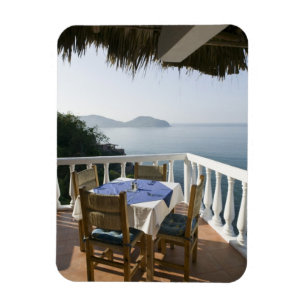 Mexico, Guerrero, Zihuatanejo. Cafe Table over Magnet