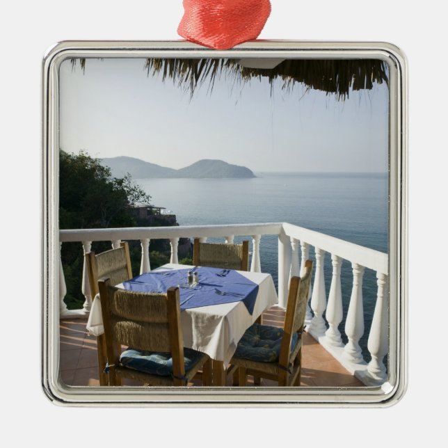 Mexico, Guerrero, Zihuatanejo. Cafe Table over Metal Ornament (Front)