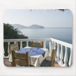 Mexico, Guerrero, Zihuatanejo. Cafe Table over Mouse Pad