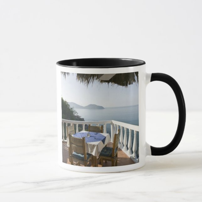 Mexico, Guerrero, Zihuatanejo. Cafe Table over Mug (Right)