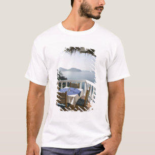 Mexico, Guerrero, Zihuatanejo. Cafe Table over T-Shirt