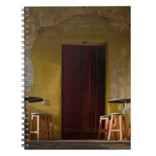 Mexico, Oaxaca, Afternoon sun lights balcony of Notebook