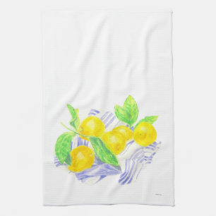 Meyer lemons on kitchen towel