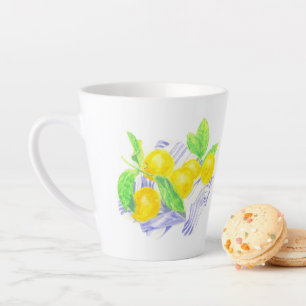 Meyer lemons on kitchen towel latte mug