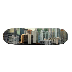 Miami skyscrapers against wide clear sky skateboard