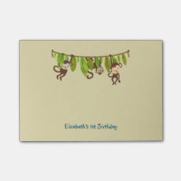 Michievous Monkeys Hanging from a Jungle Vine