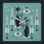 Mid Century Atomic Kitty Christmas ©studioxtine Square Wall Clock<br><div class="desc">My original vector illustration of vintage inspired cats,  Christmas trees,  ornaments,  snow and starbursts,  in black,  pink,  shades of muted teal and a hint of ivory. ©Christine Duffield 2019-21.</div>