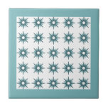 Mid-Century Modern Turquoise Starburst Pattern Ceramic Tile<br><div class="desc">Mid-century modern inspired design featuring vintage pattern of retro turquoise blue starbursts on a white background, framed in bright turquoise. Simple, clean modern design. Create your own custom pattern by uploading a new image, or use the "message" button to contact the designer for help. To create your own patterned design:...</div>