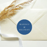 Mid-Century Wedding Flowers | Blue Classic Round Sticker<br><div class="desc">Enhance your wedding décor with our Mid-Century Wedding Flowers Blue Classic Round Sticker. Inspired by the timeless allure of mid-century design, this sticker features a captivating blue hue adorned with delicate floral motifs, adding an elegant touch to any surface. Perfect for sealing envelopes, embellishing favours, or adding a personalised touch...</div>