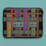 Midnight Sun Stained Glass Laptop Sleeve<br><div class="desc">This vivid and elegant panel displays examples of Renaissance stained glass. It is part of my Stained Glass Collection featuring different designs in gorgeous jewel tones. The original nineteenth century French chromolithograph print illustrates seven different motifs. I created the woven design using ribbons of stained glass patterns with rich colors...</div>