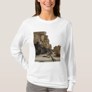 Military vehicles are locked down on semi truck T-Shirt