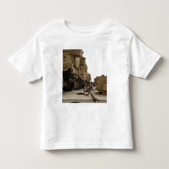 Military vehicles are locked down on semi truck toddler T-Shirt (Front)