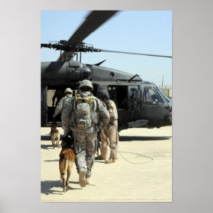 Military working dog handlers board a helicopte poster