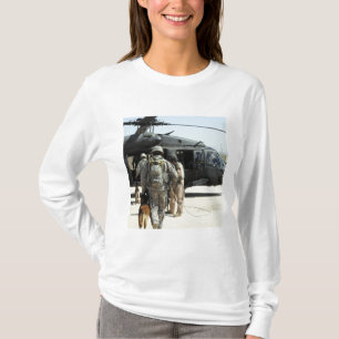 Military working dog handlers board a helicopte T-Shirt