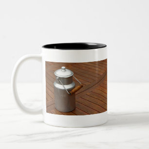Milk can on a table Two-Tone coffee mug