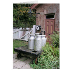 Milk churns at Stogumber Station, Somerset, UK