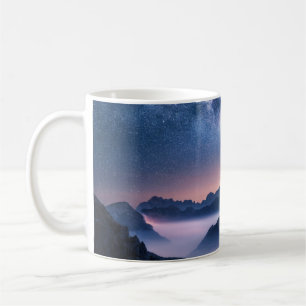 Milky Way over mountains in fog at night in summer Coffee Mug