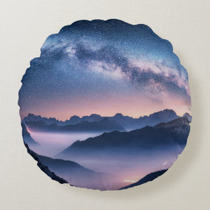 Milky Way over mountains in fog at night in summer Round Cushion