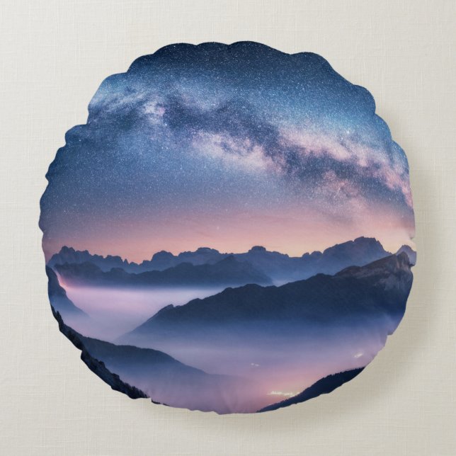 Milky Way over mountains in fog at night in summer Round Cushion (Front)