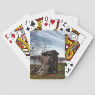 Milling about the old outhouse playing cards