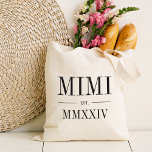 Mimi Roman Numeral Year Established Tote Bag<br><div class="desc">A modern minimalist tote bag to celebrate a chic grandma,  this clean minimal tote features "Mimi" or your choice of grandma nickname in black serif lettering. Customise with the year she became a grandmother beneath in elegant roman numerals for a chic touch.</div>
