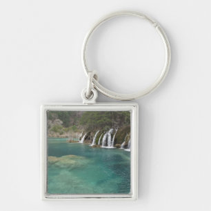 Mineral deposits make waterfalls and clear key ring