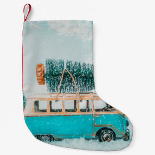 Miniature antique car carrying christmas tree on r small christmas stocking