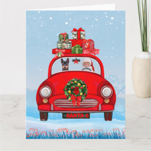 Miniature Pinscher Dog In Car With Santa Claus  Card