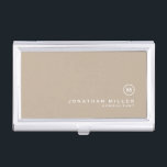 Minimal Beige Classic Monogram Business Card Holder<br><div class="desc">Minimalist monogram design with classic block monogram medallion in a classic font with personalised name and title below on a simple beige background. Personalise for your custom use.</div>