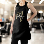 Minimal Black Gold Modern Typographic Monogram Apron<br><div class="desc">Cook in style with the Minimal Black and Gold Modern Typographic Monogram Apron. Featuring a sleek black design with a bold gold typographic monogram, this apron combines modern elegance with practicality. Perfect for cooking, baking, or grilling, it provides full coverage and comfort while you work in the kitchen. The personalised...</div>