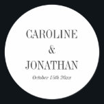 Minimal Elegant Black White Serif Wedding Names Classic Round Sticker<br><div class="desc">This wedding sticker features clean serif typography and a simple black and white layout with classic, thoughtfully written wording. The minimal design highlights the couple’s names and date clearly, creating a timeless detail that feels refined and intentional. Perfect for sealing envelopes, decorating favors, or adding a cohesive finishing touch to...</div>
