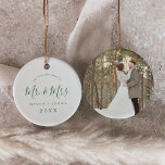 Minimal Green Newlywed 1st Christmas Wedding Photo Ceramic Ornament<br><div class="desc">This minimal green newlywed first Christmas wedding photo ceramic ornament is the perfect simple Christmas tree decoration. The design features classic green and white typography paired with a rustic yet elegant script font with hand lettered style. This keepsake ornament reads "our first Christmas as mr and mrs". Personalise the front...</div>