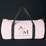 Minimal Pastel Pink Initial & Personalised  Duffle Bag<br><div class="desc">Travel in style with this Minimal Pastel Pink Initial & Personalised Duffle Bag. Featuring a sleek and minimalist design, this duffle bag is perfect for weekend getaways, gym sessions, or daily commutes. The soft pastel pink background adds a touch of elegance and femininity, while the personalised initial or name makes...</div>
