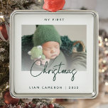 Minimal Photo Baby's First Christmas Green Script Metal Ornament<br><div class="desc">Celebrate baby's first Christmas with this modern minimalist photo keepsake ornament. The green text reads "My first Christmas, " with the word "Christmas" in trendy handwriting script. Easily replace the sample image with your favourite photo, and add baby's name and the year below. A white gradient screen helps make the...</div>