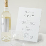 Minimal Script Wedding Bar Menu Pedestal Sign<br><div class="desc">Invite your guests to grab a favourite libation from the bar with our charming wedding bar menu sign. Design features "the bar is open" in crisp black calligraphy script and block lettering. Personalise with your drink selections beneath.</div>