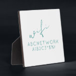 Minimal Wifi Password Sign Plaque<br><div class="desc">Keep your guests connected with this stylish Minimal WiFi Password Sign Plaque. This plaque features a simple yet modern design with a elegant turquoise font on a simple clean white background. It is perfect for displaying your WiFi password in a way that is both functional and decorative. The 5.25x5.25 size...</div>