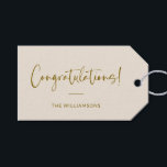Minimalist Beige Personalised Congratulations Gift Tags<br><div class="desc">A sophisticated and timeless gift tag featuring a soft cream background with elegant script and modern typography in warm gold. Perfect for adding a personalised touch to wedding gifts,  baby showers,  graduations,  or any celebratory occasion. Customise with your family name or message for a stylish and thoughtful finishing touch.</div>