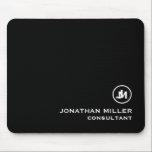 Minimalist Black and White Monogram Mouse Pad<br><div class="desc">Upgrade your work space with this minimalist black and white mouse pad featuring a simple plain white monogram in classic block typography. The mouse pad is designed with a sleek black background, giving it a touch of sophistication. Its smooth surface ensures precise and comfortable navigation of your mouse, making it...</div>