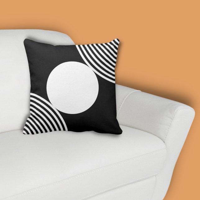 Minimalist Black & White Beads Pattern Cushion (Centered White Circle on Black Throw Pillow on White Couch with Orange Wall)