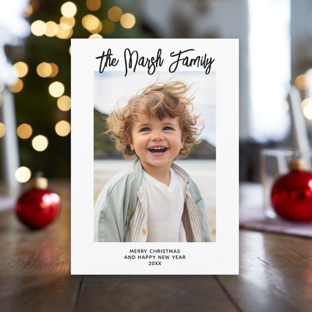 Minimalist Black White Family Handwritten Script Holiday Card (Modern, minimal Christmas Greeting card with photo, white border and script text.)