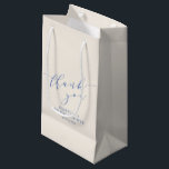 Minimalist Blue Script Bridal Shower Thank You Small Gift Bag<br><div class="desc">This personalised wedding favour gift bag features a soft champagne background with elegant blue script lettering for a timeless, refined look. The flowing handwritten “thank you” paired with classic typography creates a polished finish that works beautifully for bridal showers celebrations. Ideal for holding favours, small gifts, or welcome items for...</div>