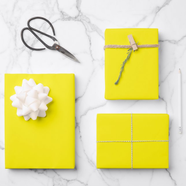 Minimalist bright yellow solid plain modern gift wrapping paper sheet (Front)