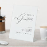 Minimalist Calligraphy Wedding Photo Guestbook Pedestal Sign<br><div class="desc">Looking for a simple and elegant way to display your photobooth guestbook? Look no further than this minimalist calligraphy wedding photobooth guestbook pedestal sign. Featuring clean black and white calligraphy script and simple modern typography, this sign is sure to complement any wedding decor. Just click "personalise" to customise this sign...</div>