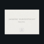 Minimalist Coastal Wedding  Place Card<br><div class="desc">Guide guests to their tables with calm, coastal elegance. These minimalist wedding escort cards feature refined serif typography on a warm ivory background, pairing guest names with table assignments in a clean, editorial layout. A whisper-soft sand dollar accent at the bottom adds a subtle seaside touch while keeping the focus...</div>