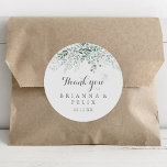 Minimalist Eucalyptus Thank You Wedding Favour Classic Round Sticker<br><div class="desc">This minimalist eucalyptus thank you wedding favour classic round sticker is perfect for a rustic wedding. The design features watercolor elegant green eucalyptus leaves. Make the sticker labels your own by including your names, the event (if applicable), and the date. These stickers can compliment a wedding reception, bridal shower, or...</div>